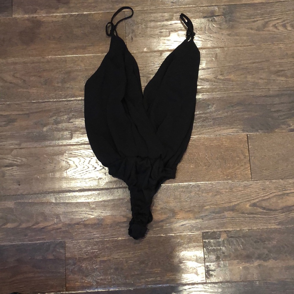 Tobi Black bodysuit. Adjustable straps size small